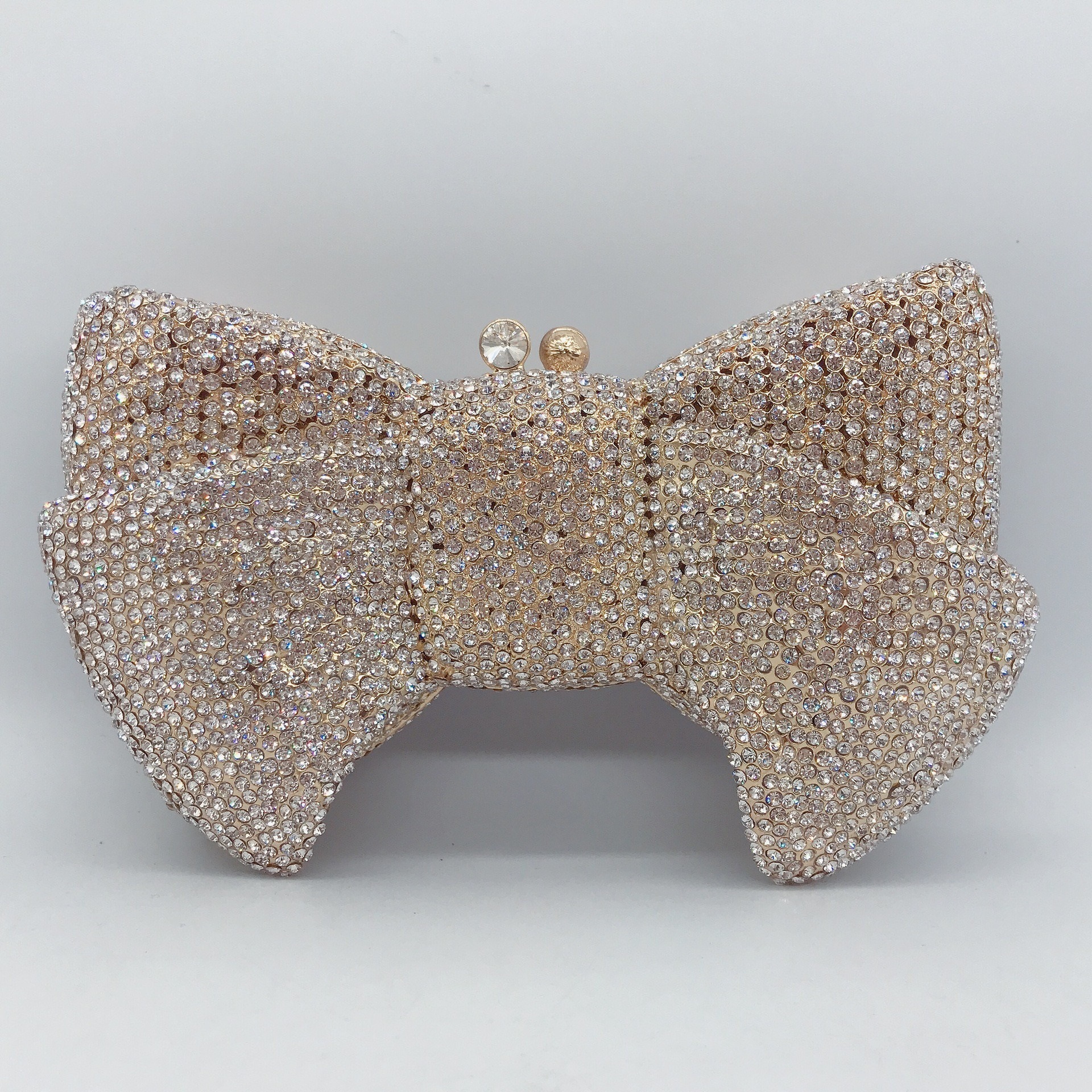 Bolso de arco transfronterizo nuevo arco de diamantes bolso de banquete de diamantes bolso de mano de mujer bolso de maquillaje pastel