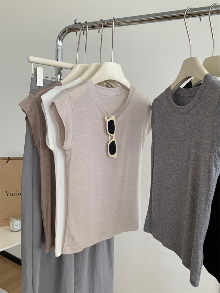 夏の新型丸首の小さい飛袖tシャツの女子学生の薄い金は身を修めてやせています。