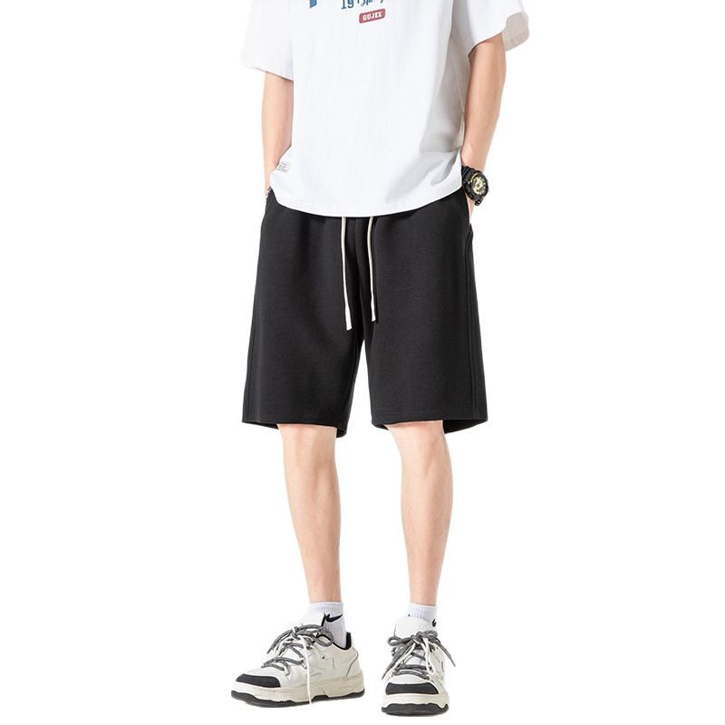 Pantalones cortos deportivos de punto de algodón chino 2025 nuevos productos de verano estilo básico calle sueltos pantalones de cinco puntos de marca de moda americana