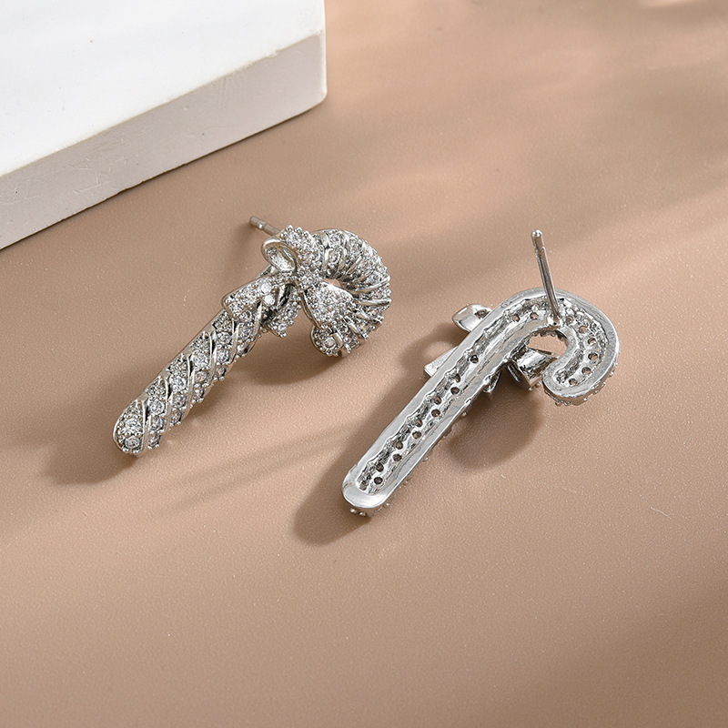 S925 Silber Nadel Japanische und Koreanische Mode Ohrringe Kupfer Micro intarsien Zirkon Fee Stick Schmetterling Knoten Ohrringe Einfache und Vielseitige Ohrringe f_voghion.com