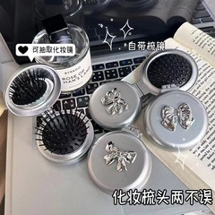 新しいかわいい蝶結びの櫛のミニは小さくて携帯して鏡の櫛の2つの一体の折り畳みの女性を持ちます。