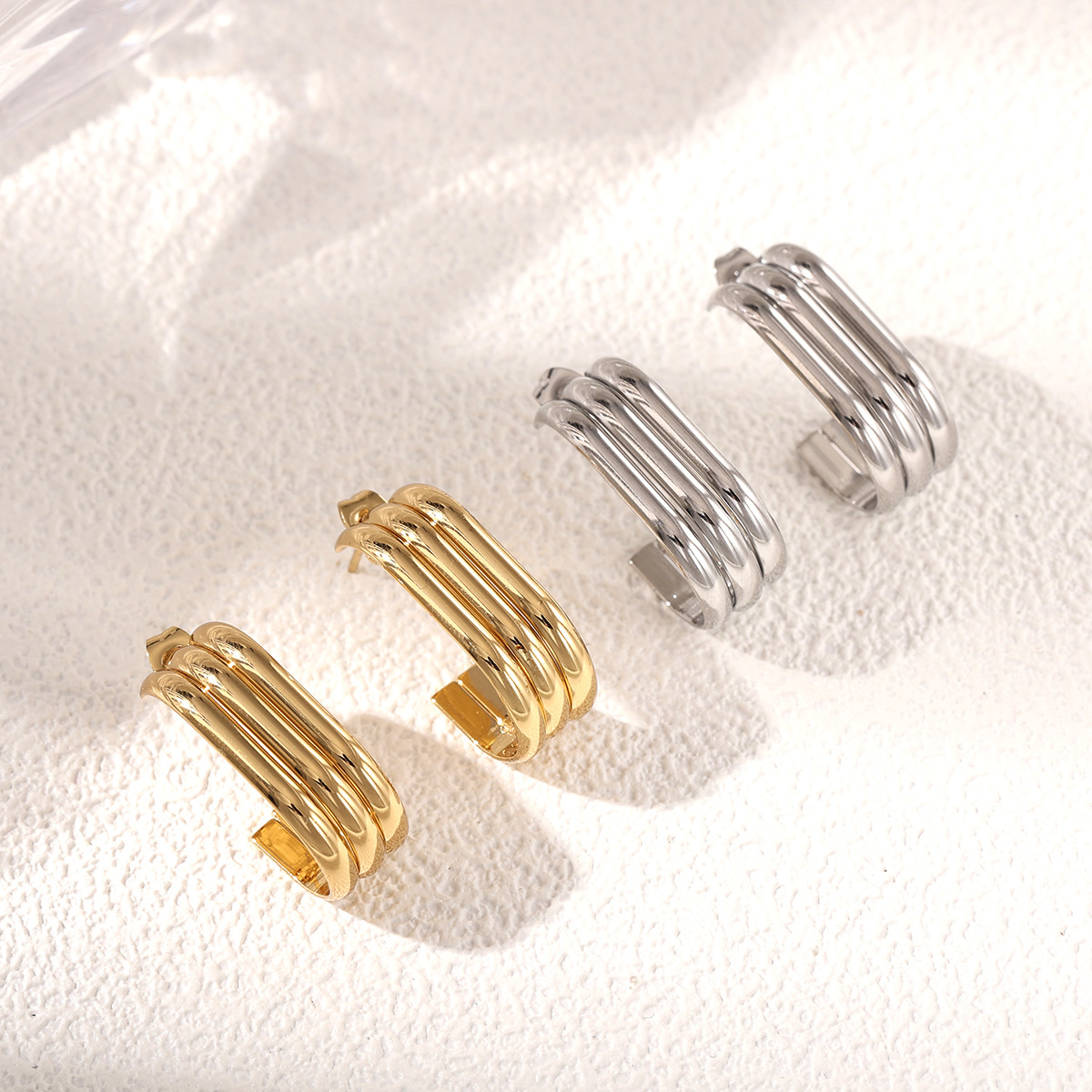 TENA Europa y los Estados Unidos lujosos pendientes de acero inoxidable de alta calidad pendientes de acero dorado venta cruzada de joyas de acero de titanio para mujeres image 5