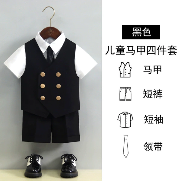 Black vest, shorts, white shirt, tie