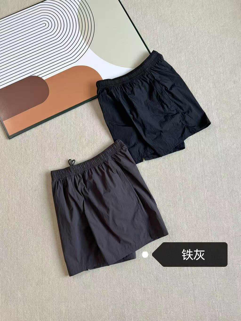 2025 verano nuevo co-marcado para hombres y mujeres transfronterizos pantalones cortos deportivos de tejido 8194