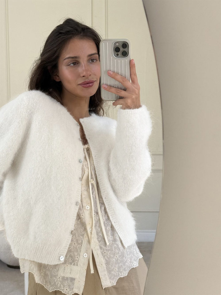 Áo khoác cardigan len nữ dáng rộng một hàng cúc, chất liệu dệt kim mềm mại, phong cách thanh lịch — Màu hồng nhạt (hàng có sẵn), Màu xanh lá cây (có hàng), Màu xanh ô liu (đốm), Màu xanh đậm (Còn hàng) chi tiết 3