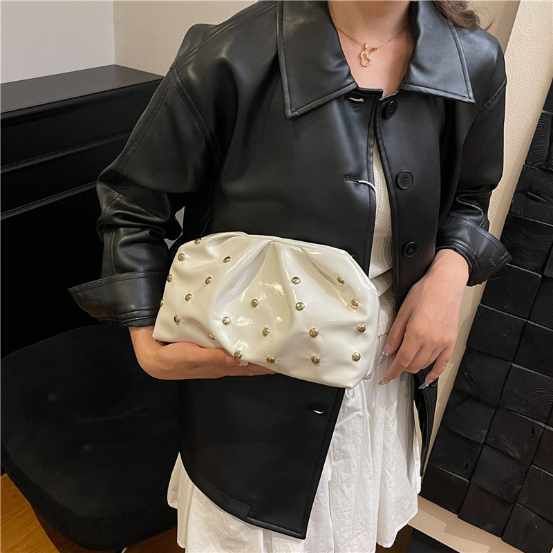 Plegado versátil punto de onda de moda simple bolso de cena de mujer estilo de la República de China retro ocio de alto grado temperamento bolso de mano