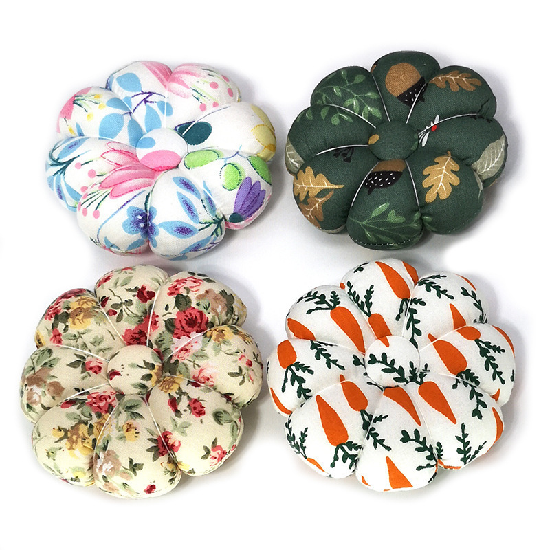 Enchufe de aguja de muñeca de estilo pastoral europeo y americano transfronterizo, almohadilla de aguja, bolsa de inserción de aguja de calabaza, herramienta de costura manual E212