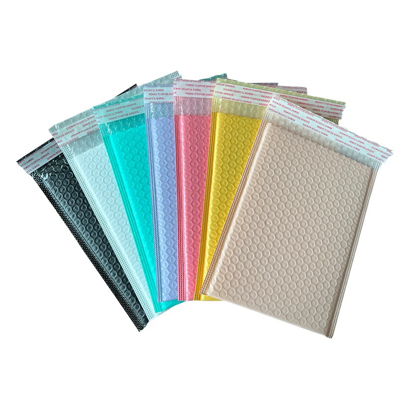 Color de película coextruida ropa material de embalaje espuma bolsa Express película coextruida bolsa de burbuja bolsa autoadhesiva Bolsa De sobre impermeable
