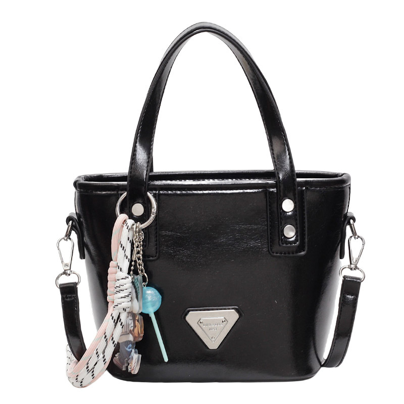 Paquete portátil de cuero de cera de aceite de alta calidad para mujeres 2025 nuevo estilo coreano bolso de hombro de estilo extranjero bolso retro versátil