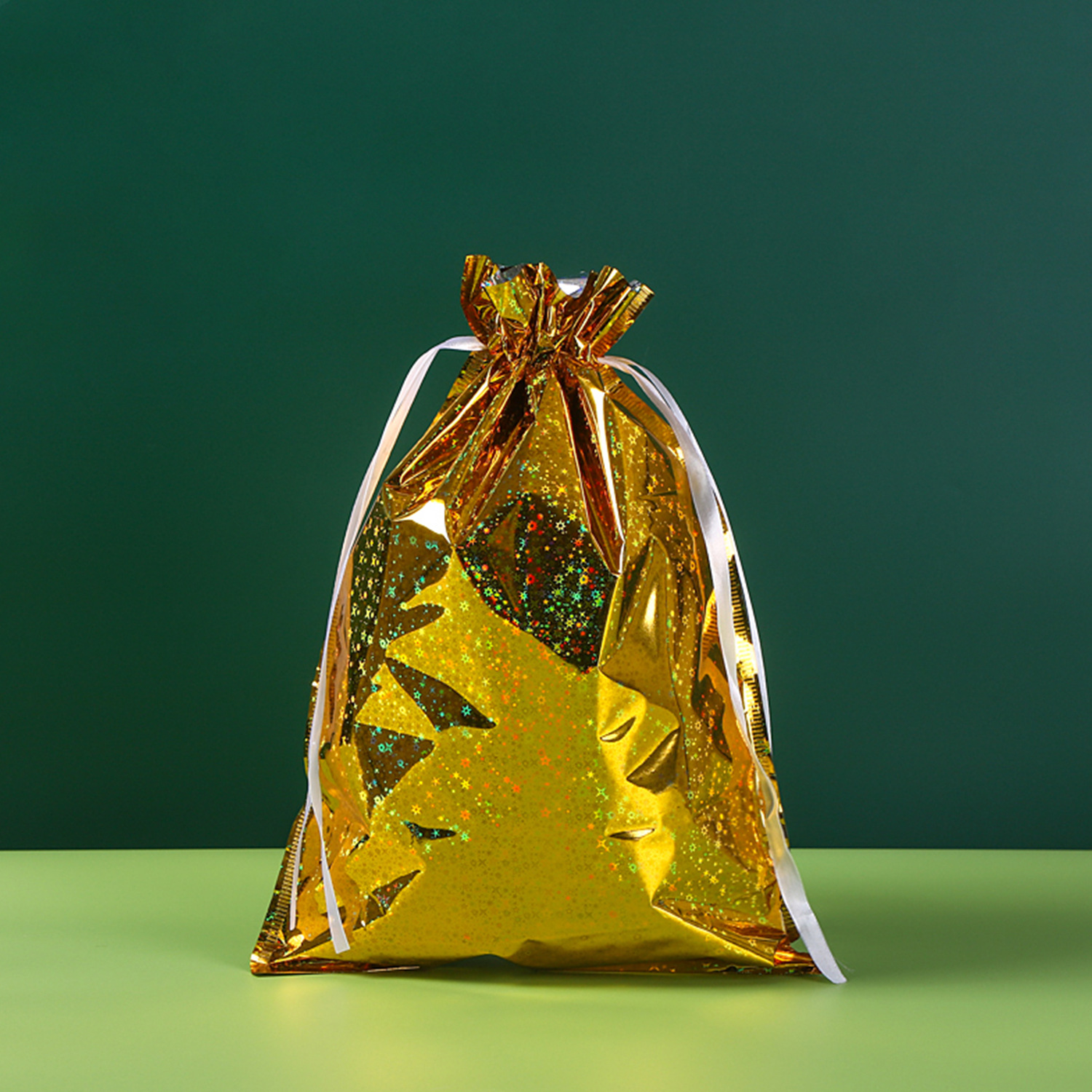 Inventario de cinta de cuerda de dibujo bolsas de dulces de plástico bolsas de regalo frescas bolsas de láser bolsas de regalo Navidad