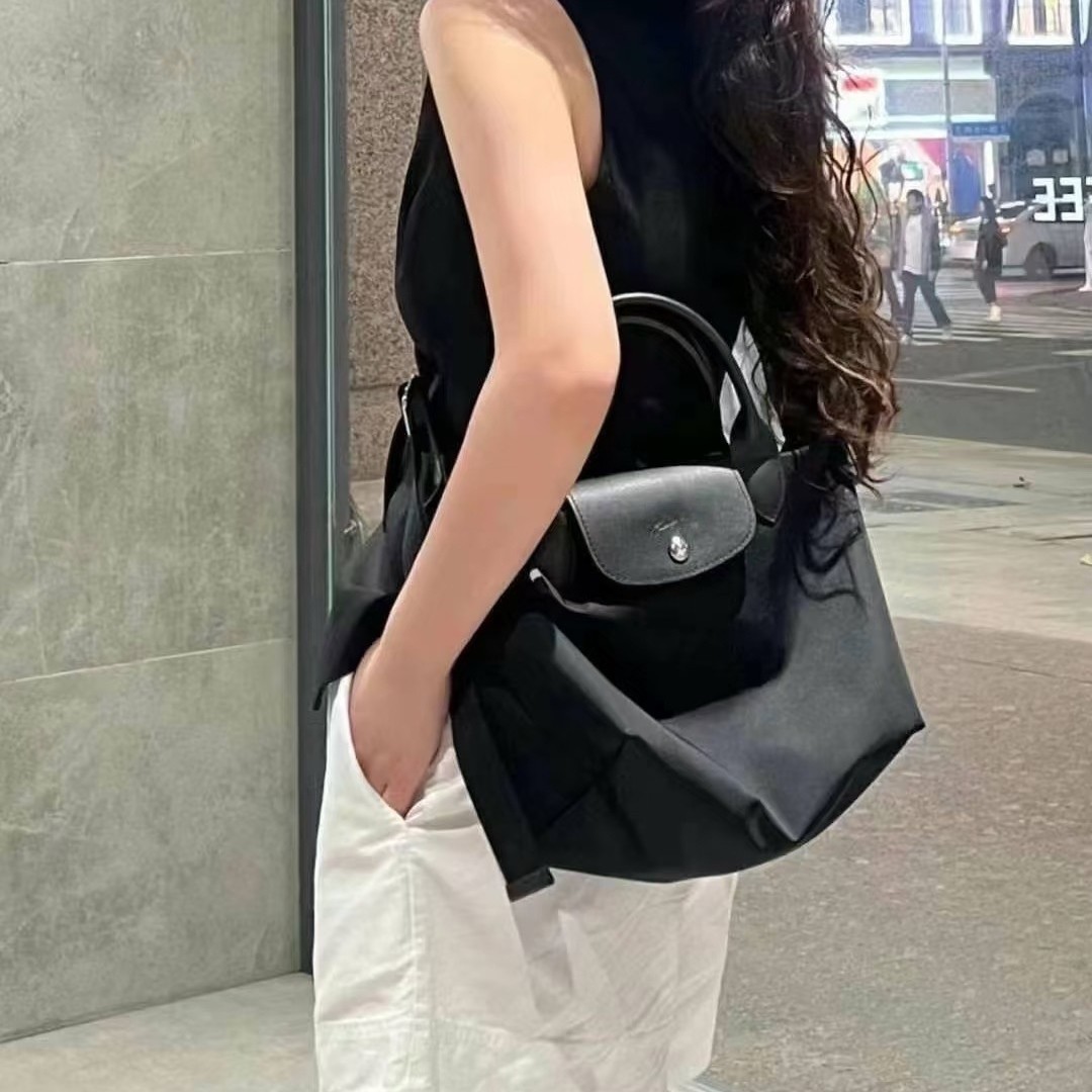 Agencia de distribución transfronteriza, segunda generación de productos de alta calidad, tela reciclada, bolsa de bola de masa, bandolera, bolso de mano