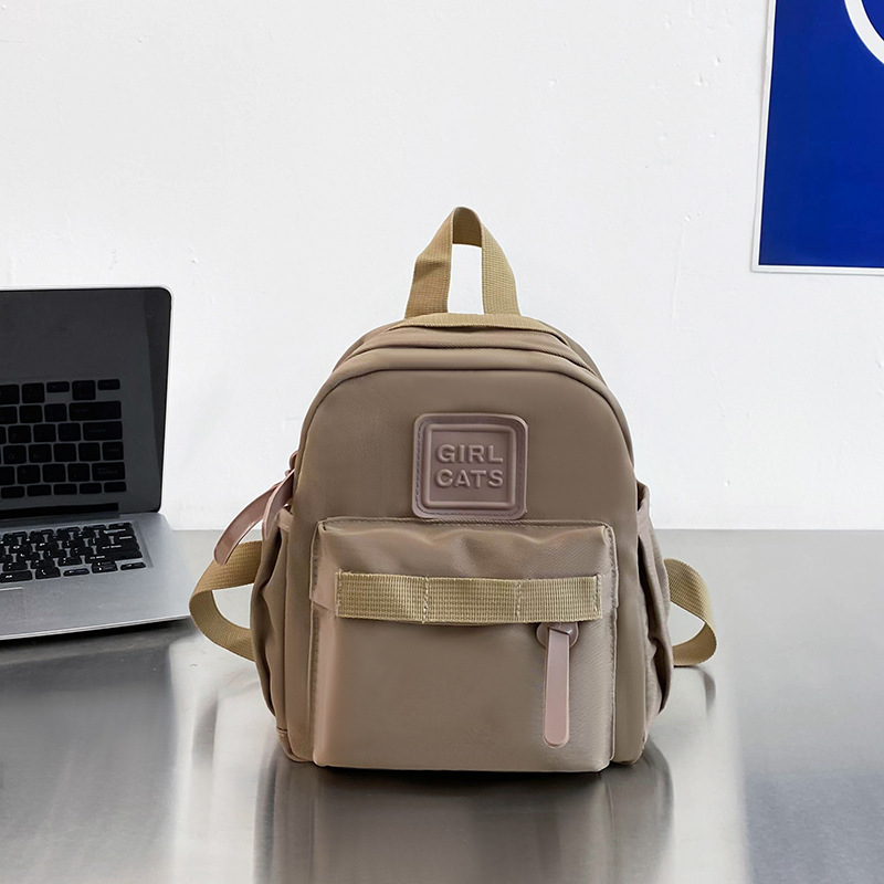 Nuevo estilo japonés de los niños de color sólido mini mochila lindo niños y niñas mochila simple kindergarten schoolbag