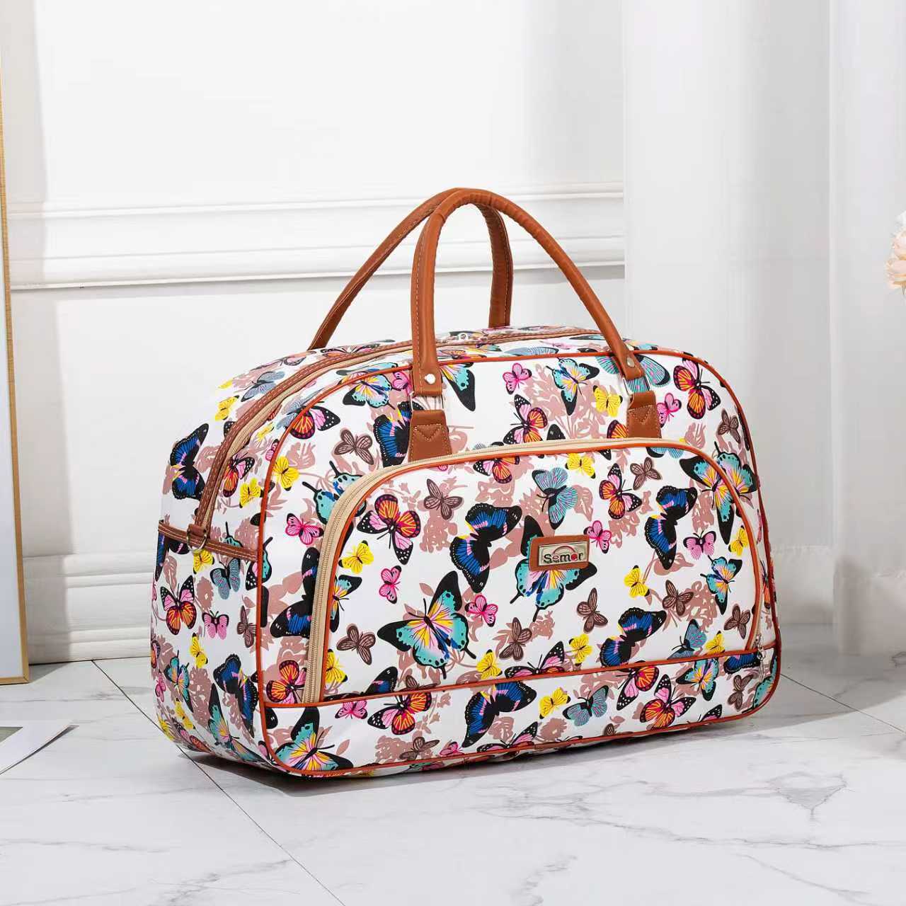 Fábrica directa bolsa de viaje portátil bolsa de equipaje PU bolsa de regalo tamaño bolsa impermeable viaje corto bolsa de embarque al por mayor