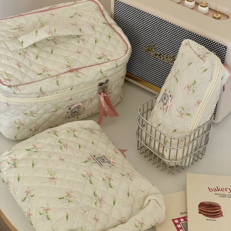 Versión coreana de la bolsa de cosméticos con lazo simple, bolsa de lavado de viaje portátil de gran capacidad, bolsa de almacenamiento de cosméticos para niñas