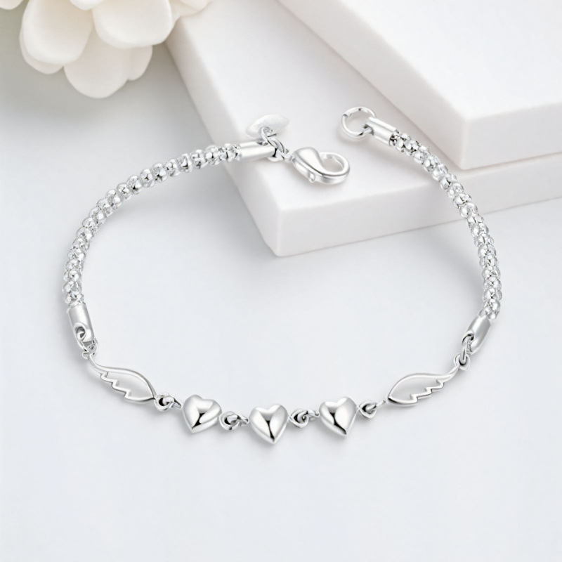 Pulseira minimalista de pena prateada para mulher joia coração_voghion.com