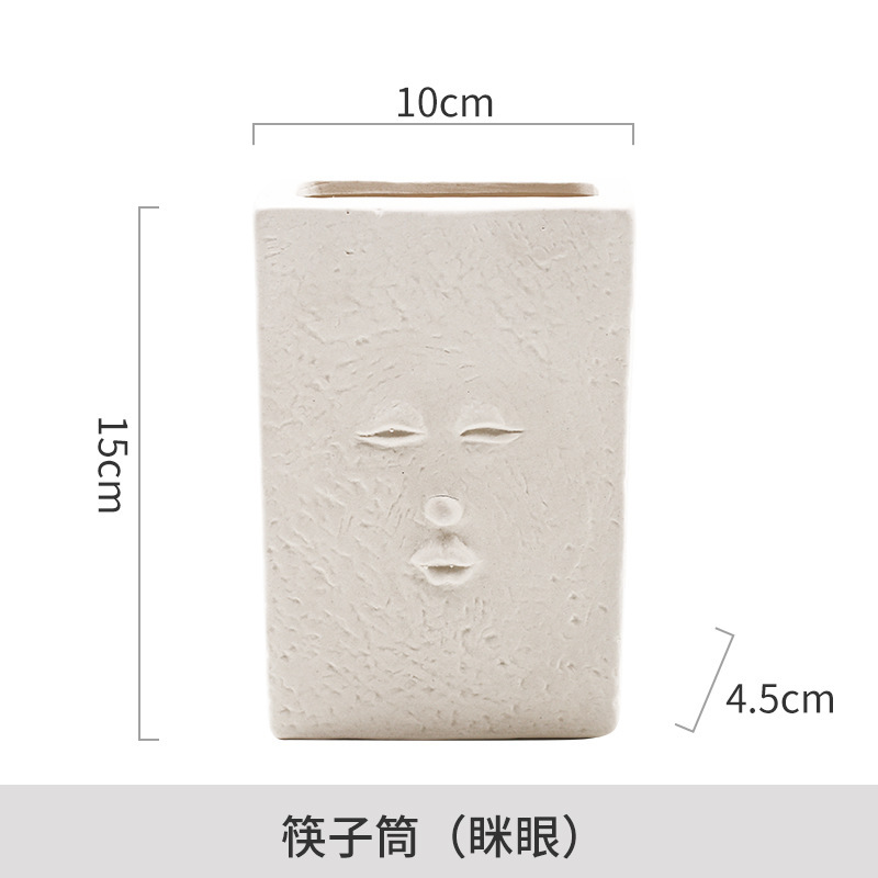 Venta directa de fábrica Soporte de tubo de palillos simple Tubo de cerámica de lujo ligero Adornos cuadrados Cara humana creativa nórdica Tubo de almacenamiento abstracto image 8