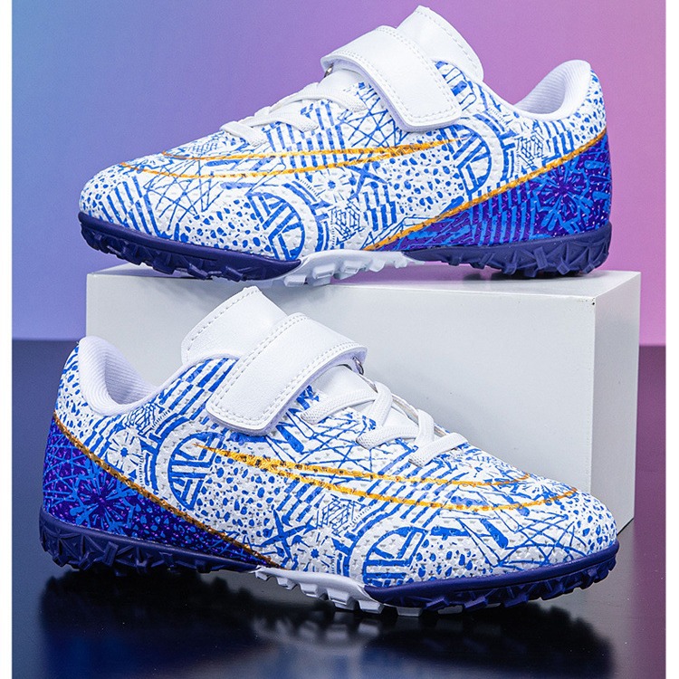 Zapatos de fútbol para niños con velcro bajo nuevo tipo de zapatos de entrenamiento transfronterizos de entrenamiento profesional de estudiantes de fútbol con clavos largos