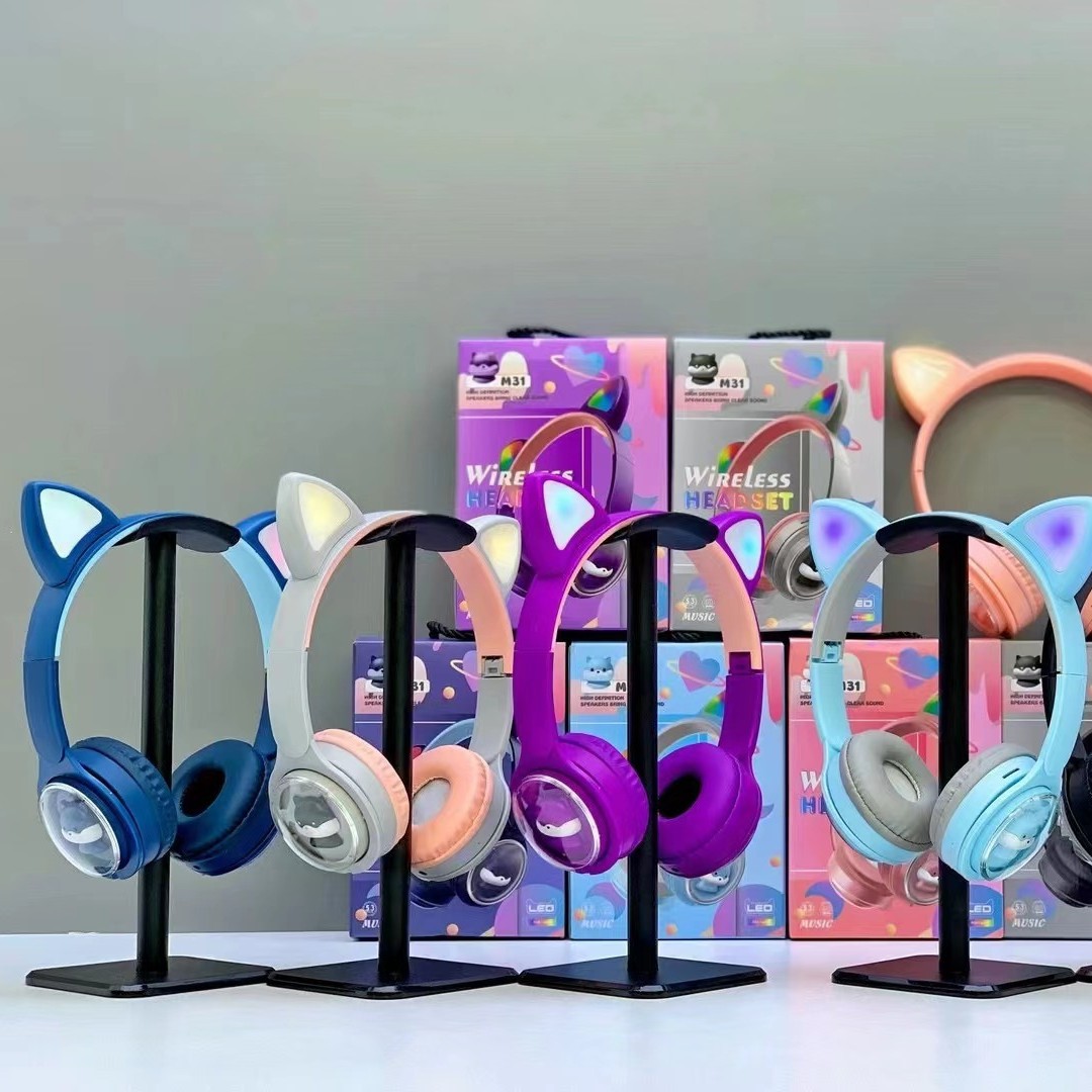 Comercio exterior explosivo M31 auriculares Bluetooth auriculares luminosos plegables serie P auriculares de juegos deportivos inalámbricos