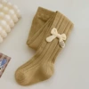 Yellow tights with bow, with embroidery