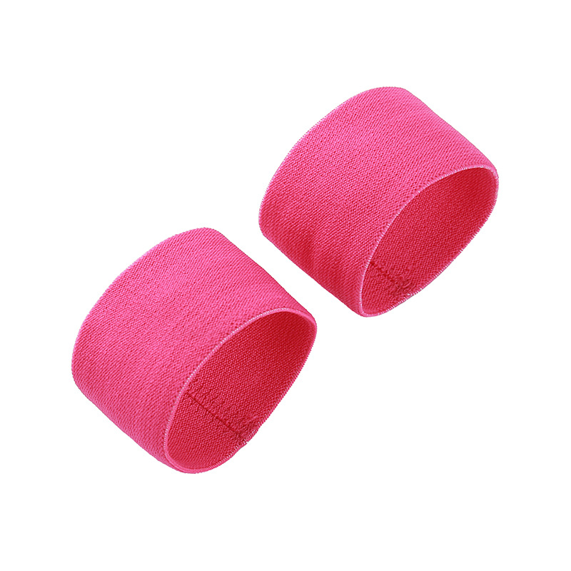 A pair of rose pink wristbands