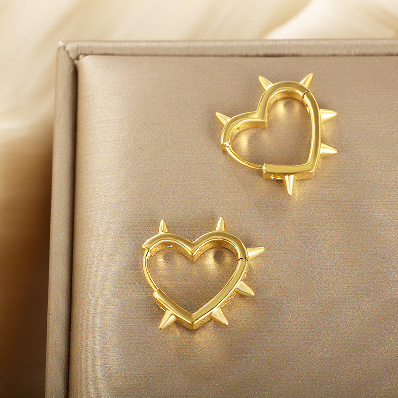 Xuping Cross-border hip-hop personalidad de estilo de amor en forma especial pendientes de orejas de temperamento de alto nivel de nicho mujeres al por mayor