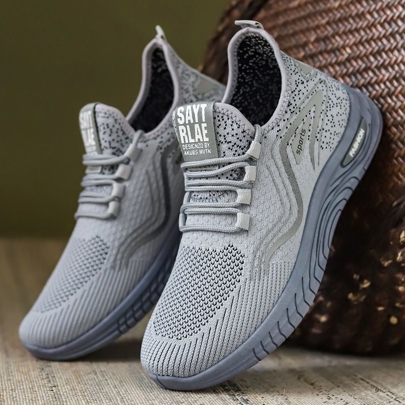 Zapatos de hombre otoño nuevo comercio exterior transfronterizo tejido transpirable zapatos de hombre procesamiento personalizado zapatos deportivos fabricantes de hombres al por mayor