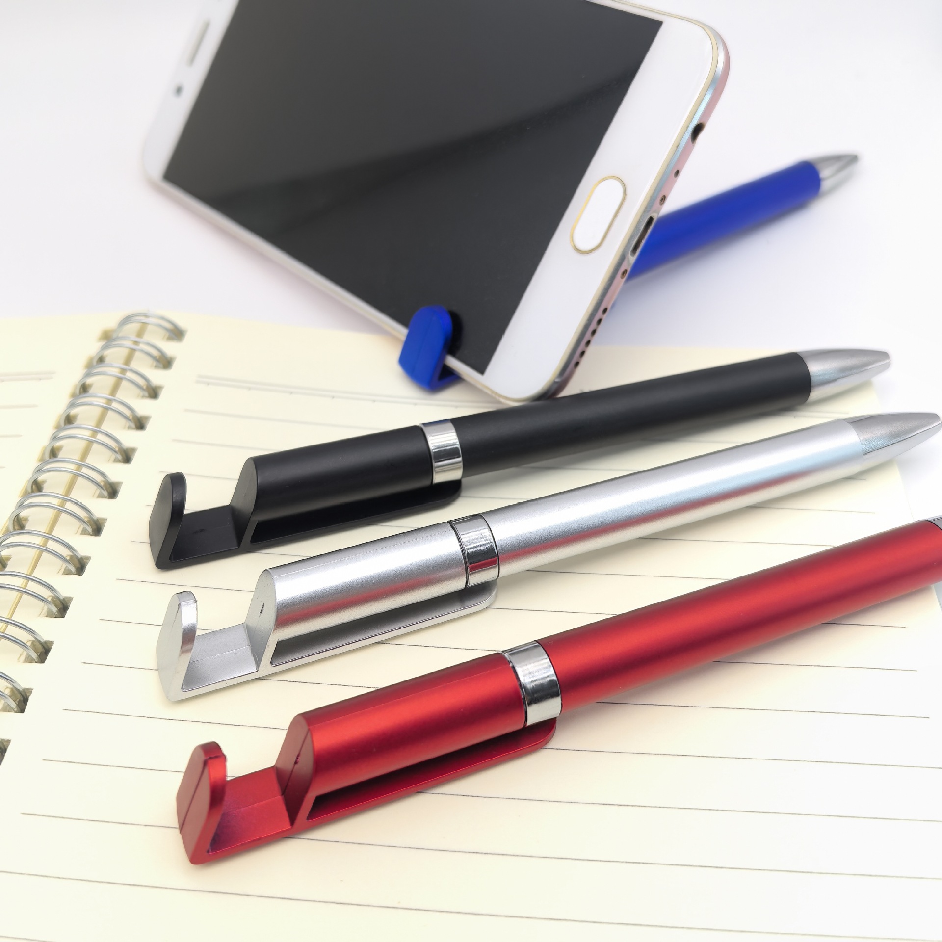 Bolígrafo de soporte para teléfono móvil multifunción Bolígrafo de regalo al por mayor Bolígrafo de plástico retorcido personalizado Bolígrafo publicitario de soporte para teléfono móvil