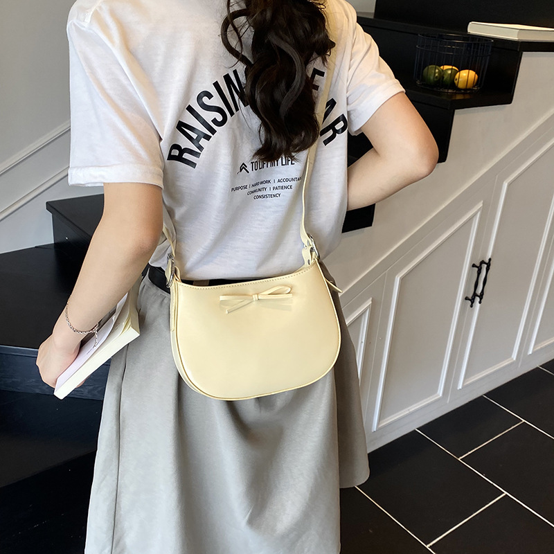 Nicho coreano de lujo ligero arco brazo bolso para mujeres 2025 nuevo estilo versátil bolso de hombro de estilo extranjero bolso de moda