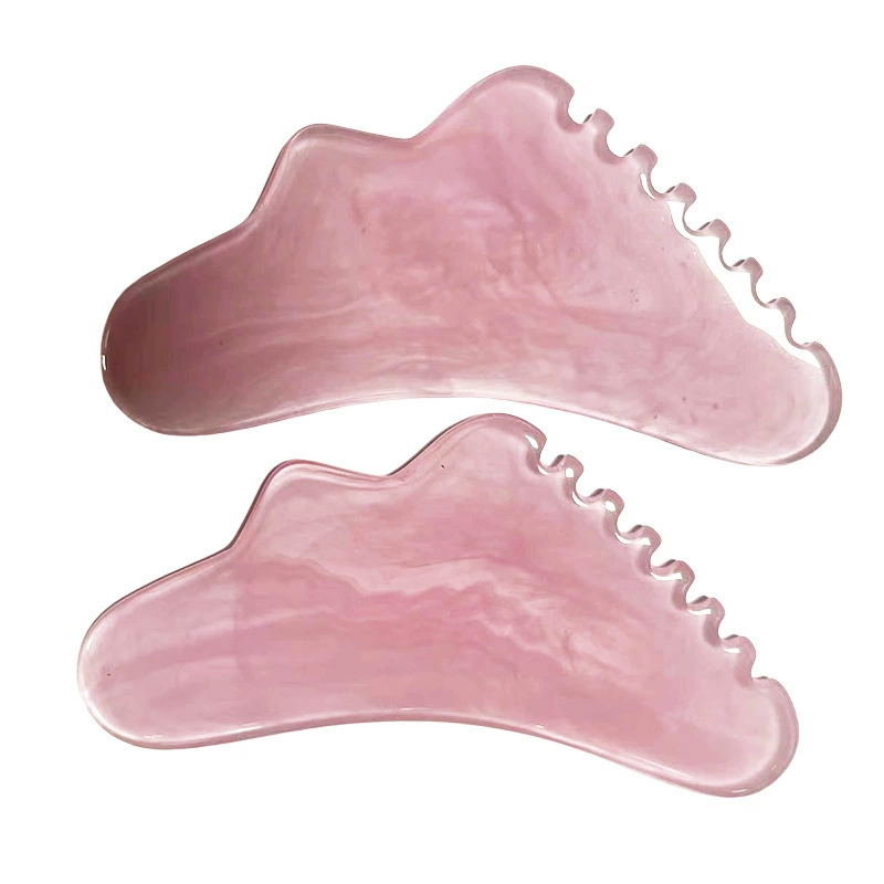 Fuchsia scalloped cosmetic handheld massager for face
