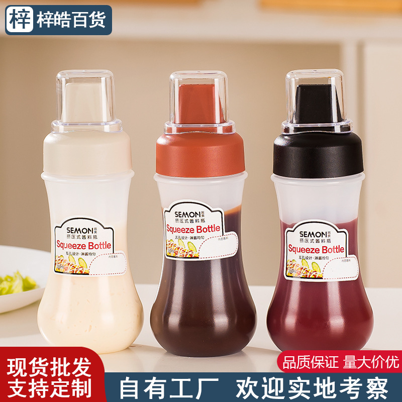 Salsa de ensalada salsa de tomate botella de salsa de exprimido botella de condimento de cocina con cubierta de polvo escala de cinco agujeros botella de salsa de exprimido de alimentos