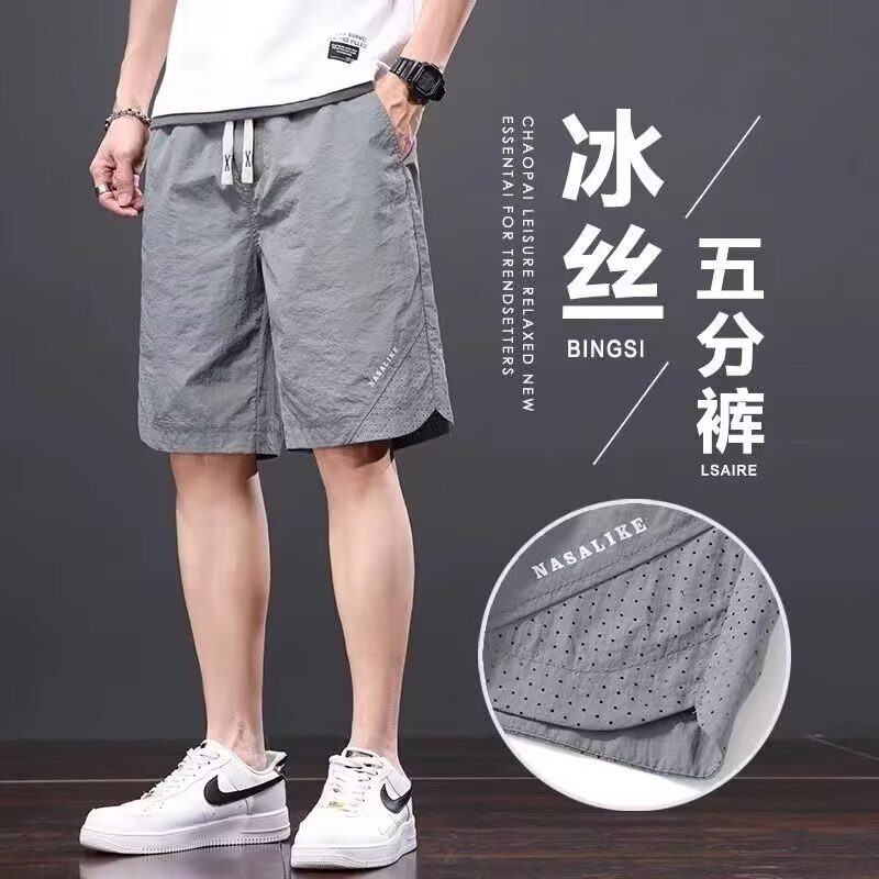 Camisas, menos ropa, pantalones de verano de cinco puntos, holgados y cómodos, todo-fósforo, pantalones casuales de estilo de Hong Kong, deportes para hombres, hombres estadounidenses, de secado rápido