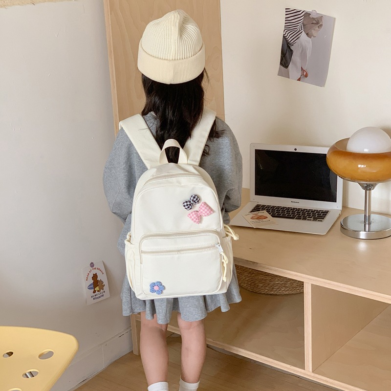 Mochila escolar de gran capacidad, lindas flores, arco, mochila para niños y niñas, 2026 nueva moda de mochila infantil