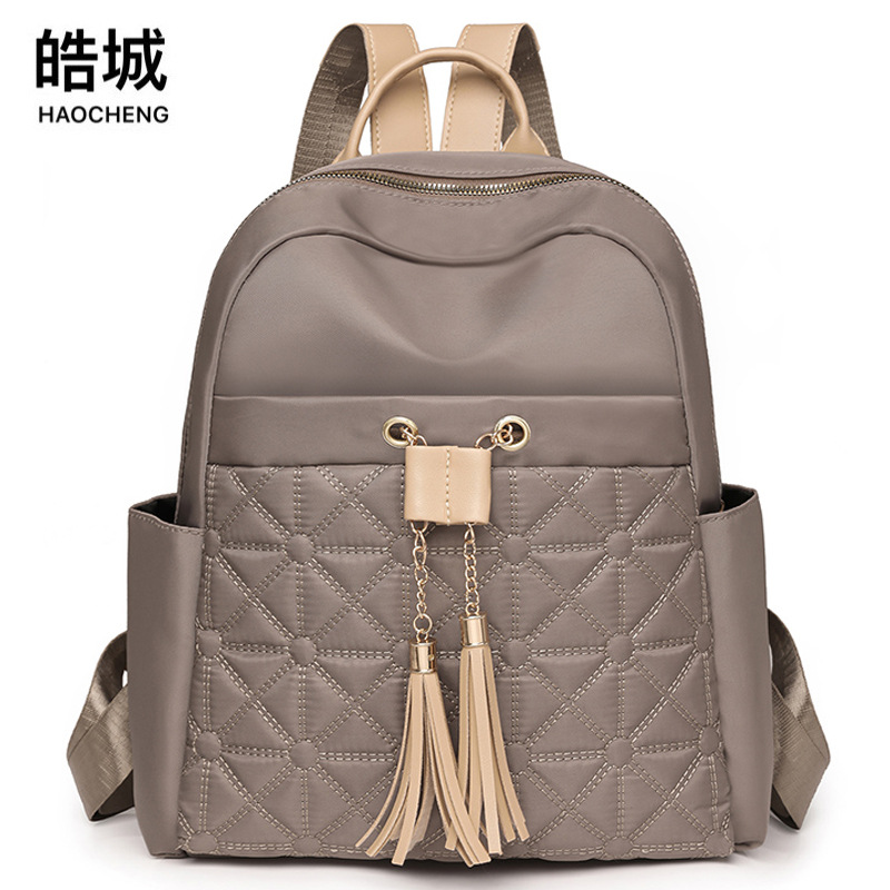 Bolso de las mujeres 2024 nuevo estilo coreano mochila de nylon de moda simple urbano de viaje mochila