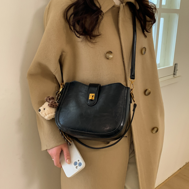 Vintage cera de piel debajo de la axila bolso de cubo bolso de viaje para mujeres otoño y invierno 2025 nuevo estilo coreano mochila de hombro casual