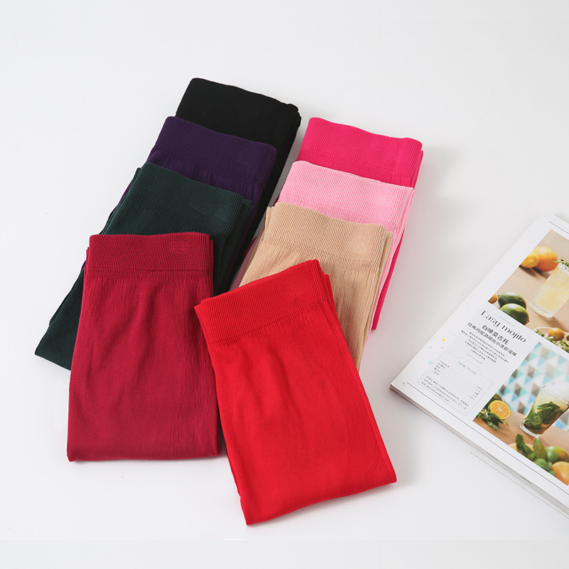 Ropa interior térmica de alta elasticidad con retención de calor de tres segundos para mujer, conjunto de top y pantalón de cuello redondo de color sólido, delgado y cálido para invierno, a la moda.