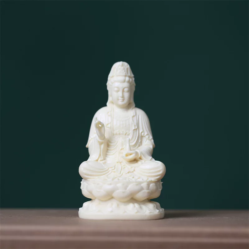 Ivory Fruit Guanyin Bodhisattva statue is located in a lotus dwelling net bottle Guanyin decoration Buddha statue to worship home car decoration