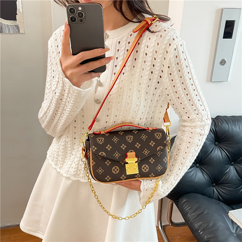 Bolso de textura transfronteriza 2025 verano nuevo bolso femenino retro color contraste bolso de hombro cadena de moda bolso de mensajero marea