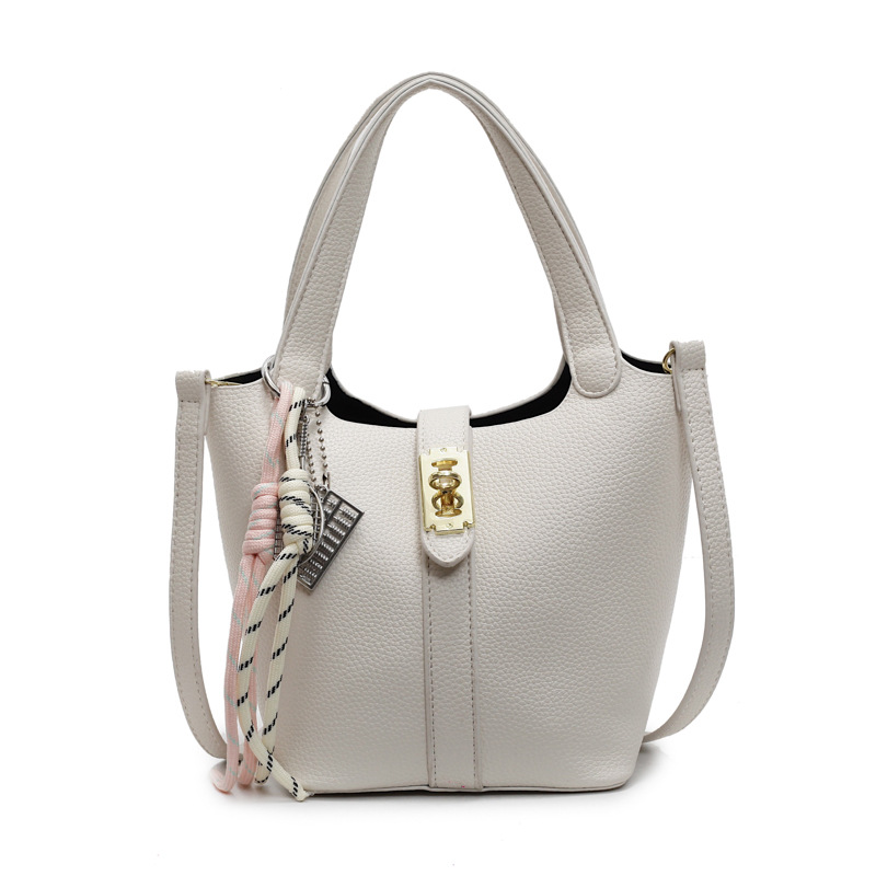 Este año, la popularidad de la bolsa de cubo para mujeres de alta calidad, el nuevo tipo 2025 de moda universal, bolso de transporte, bolso de moda extranjero