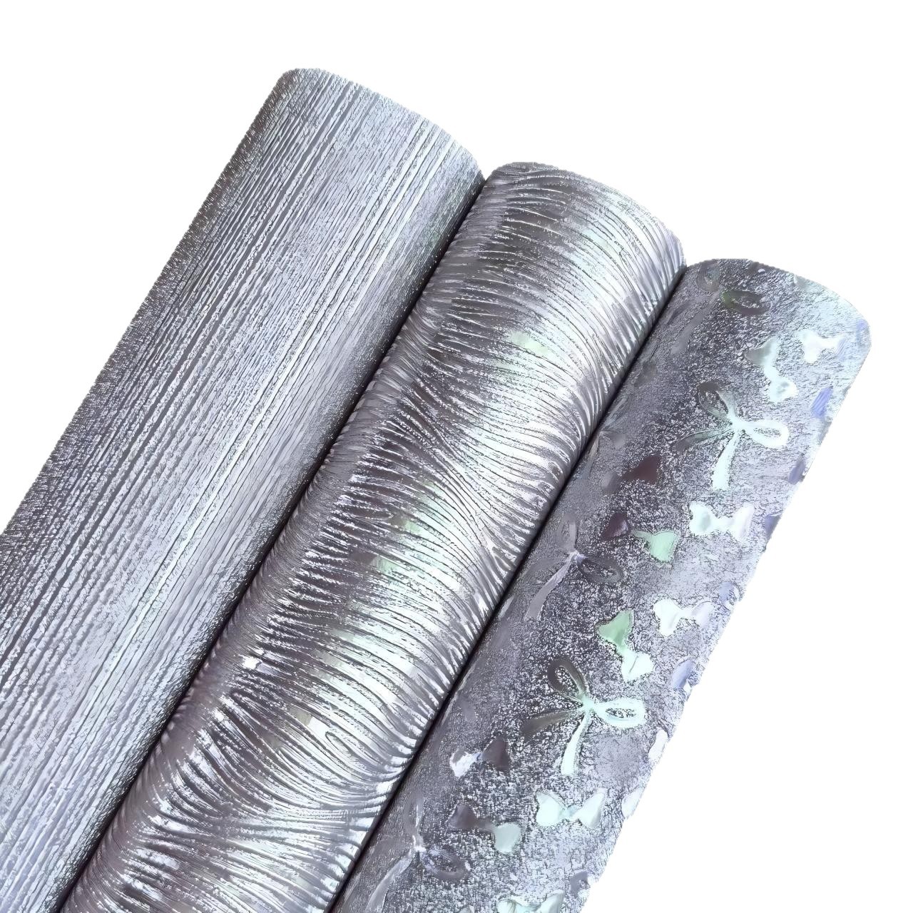 Cinderella Small Roll Silver Embossed Glitter Fabric with Wave Stripes and Fine Glitter Bow