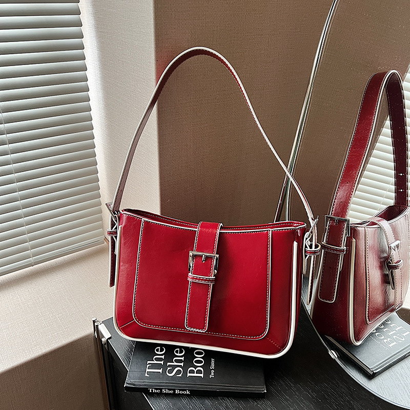 Bolso de axila retro estilo Hong Kong 2025 verano nuevo bolso femenino de alta calidad textura bolso de hombro de todo fósforo de viaje marea