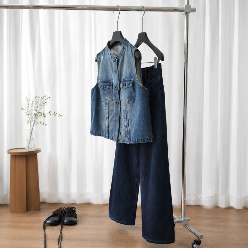 Simple, vintage-style, distressed Turkish soft denim vest with a stand-up collar. Relaxed and stylish, perfect for layering, in a clean denim blue Simple, vintage-style, distressed Turkish soft denim vest with a stand-up collar. Relaxed and stylish, perfect for layering, in a clean denim blue