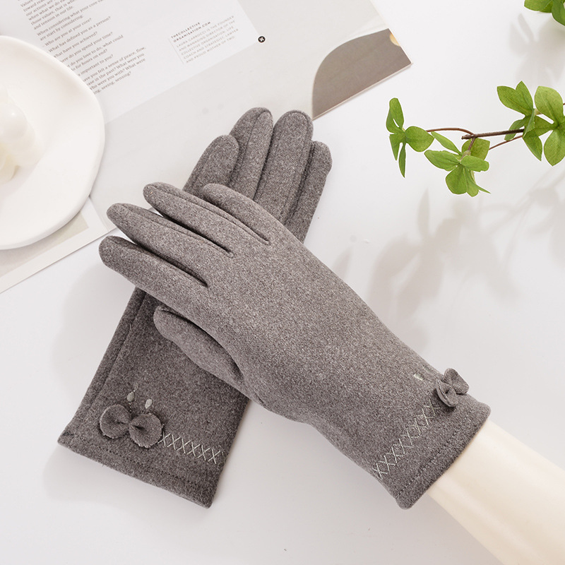 Nuevos guantes cálidos de piel de conejo para mujer, guantes de invierno y otoño, guantes Xinji, a prueba de viento, forrados de lana, a prueba de frío, versión gruesa, venta al por mayor.