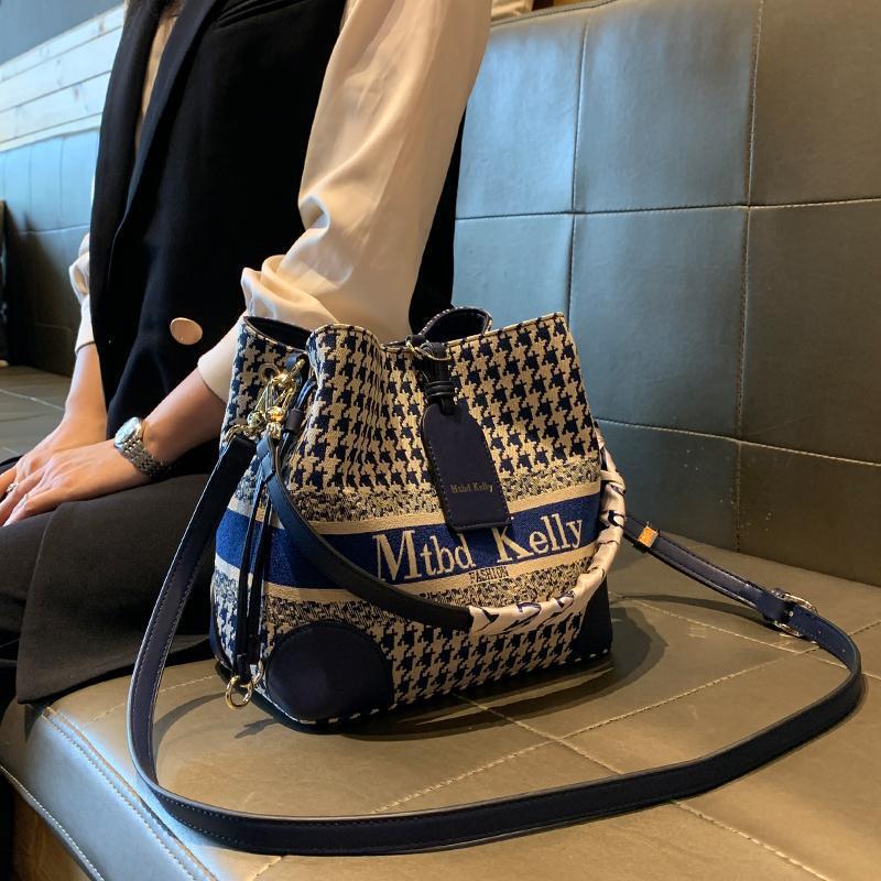 Hong Kong Purchasing Genuine Leather Women's Bag 2025 New Style Houndstooth Bucket Bag Fashionable Satchel Crossbody Bag Versatile Trend Hong Kong Purchasing Genuine Leather Women's Bag 2025 New Style Houndstooth Bucket Bag Fashionable Satchel Crossbody Bag Versatile Trend