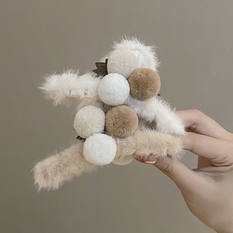Double-sided pom plush gripper