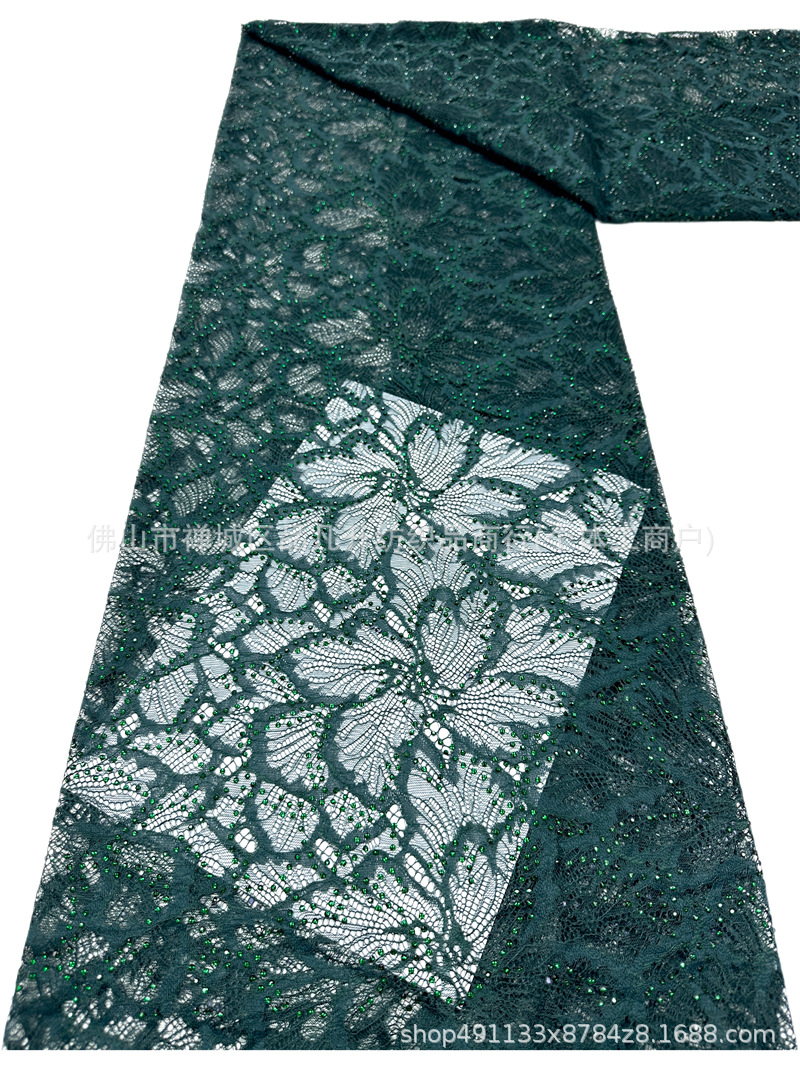 Nuevo hueco flor de encaje fondo tela de perforación caliente pesada cola de pez vestido de boda vestido de noche brindis tela spot