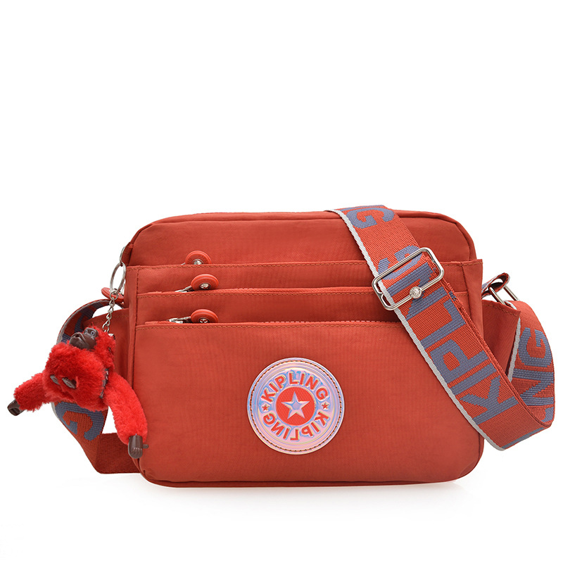 Nuevo bolso de hombro para mujer kp bolso de mensajero de tela de nailon anti-salpicaduras ultraligero nuevo colgante de mono estándar damas compras diagonales