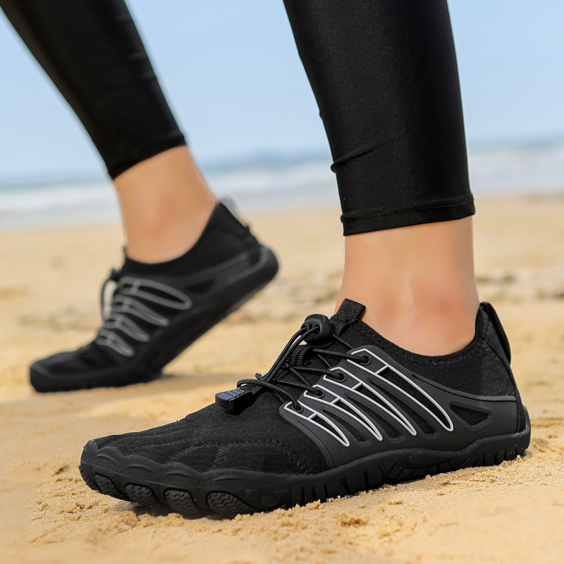 Zapatos de playa transfronterizos de pareja transpirables antideslizantes y rápidos, cinco dedos, zapatos de surf, zapatos de buceo, descubierto al por mayor.