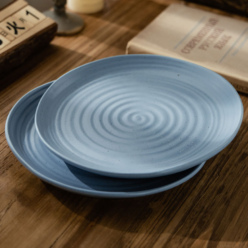 Plato de pasta de cerámica occidental de alto nivel creativo de anillo azul platos de platos redondos caseros platos de cubierta al por mayor