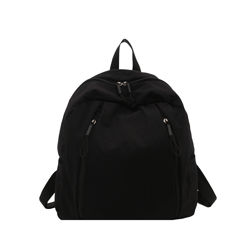 Mochila de clase universitaria casual nicho de diseño de color sólido 2025 nueva gran capacidad de viaje de viaje de viaje de la moda