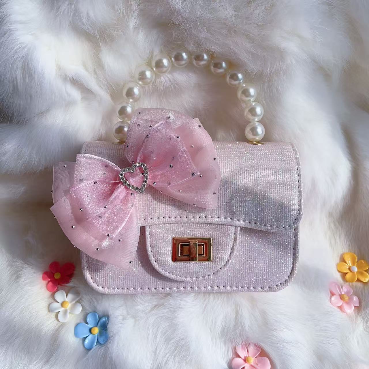 Nuevo tipo de bolsos para niños, bolsos de moda, bolsos de princesa de viento, bolsos portátiles lindos para chicas, bolsos de red para bebés.